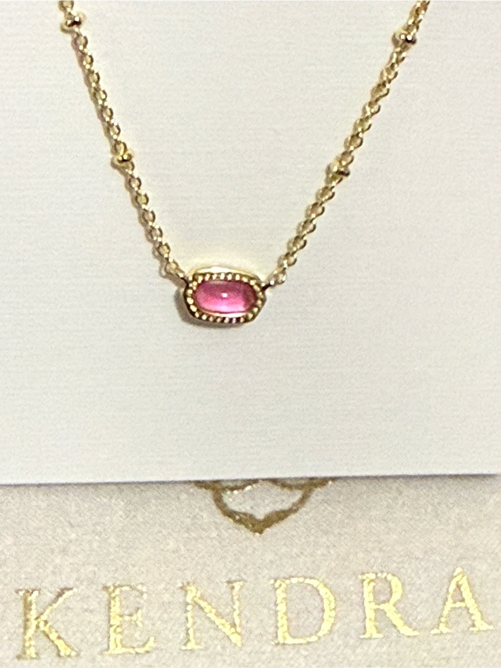 Kendra Scott Gold Necklace with Pink Oval Cabochon